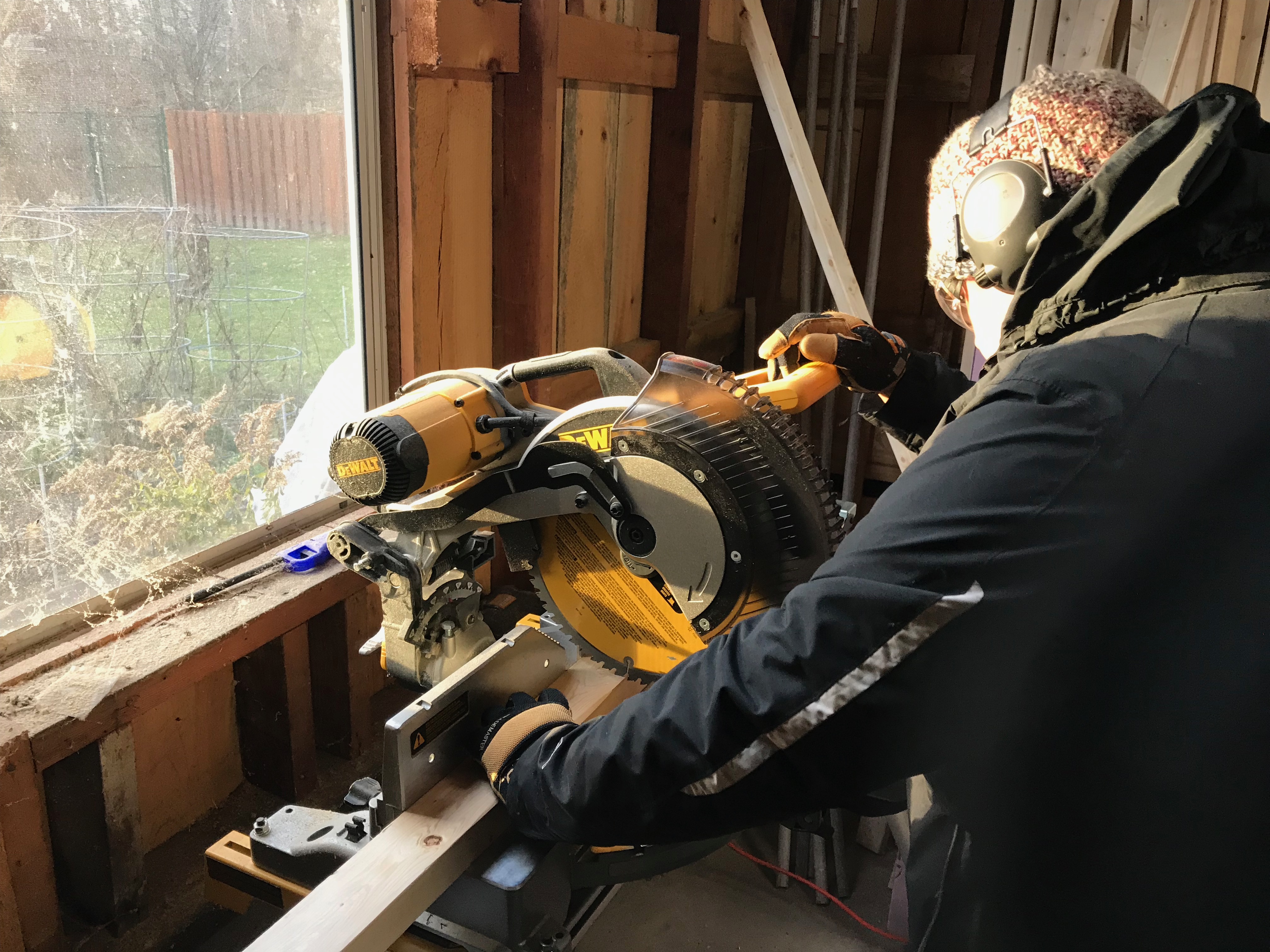 dachary uses miter saw