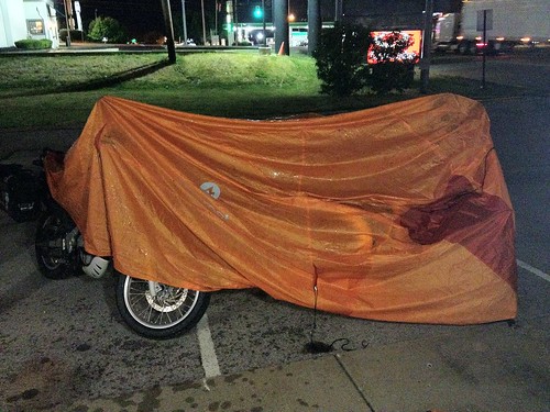 An excessively wet rain fly makes an impromptu bike cover